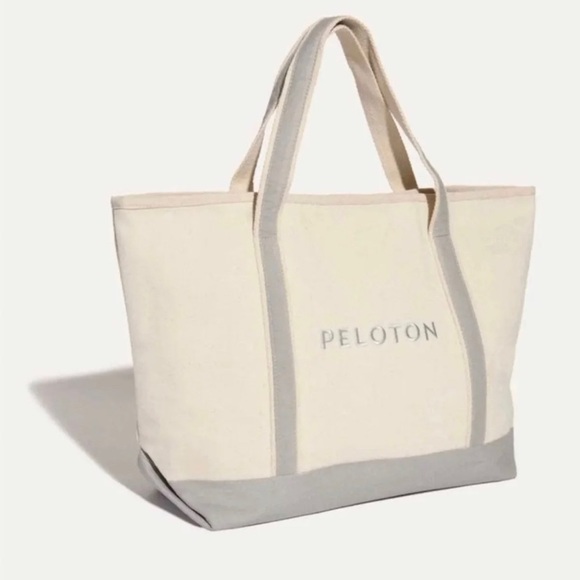 Peloton Handbags - PELOTON BAG ALMOST NEW EUC THREADS CANVAS LOGO ZIP